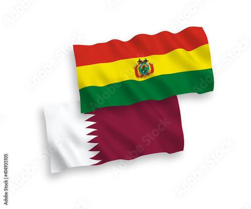 National vector fabric wave flags of Bolivia and Qatar isolated on white background. 1 to 2 proportion.