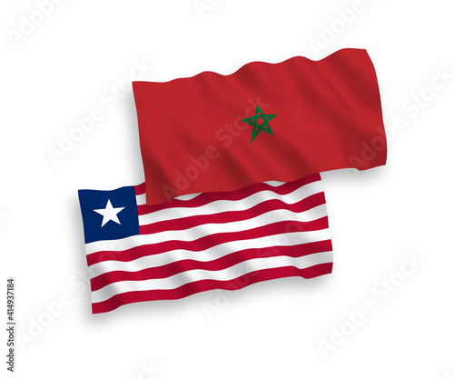National vector fabric wave flags of Liberia and Morocco isolated on white background. 1 to 2 proportion.