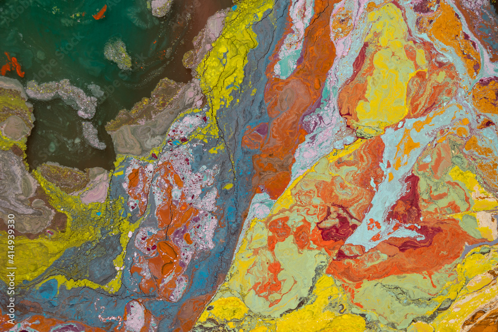 Abstract colorful background. Close-up of mixed oil paints.