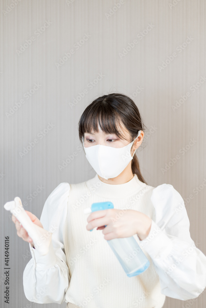 Woman preparing for alcohol disinfection