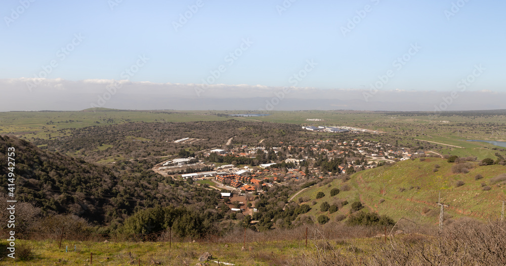 A panoramic  view from Mount Benthal of the nearby valley, settlements and fields, in the Golan Heights, in northern Israel