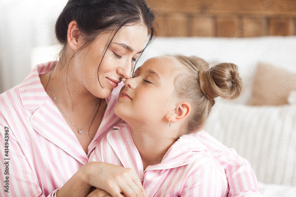 Mother and daughter having fun at home. Girls indoors. Mother and daughter having fun at home. Girls indoors.