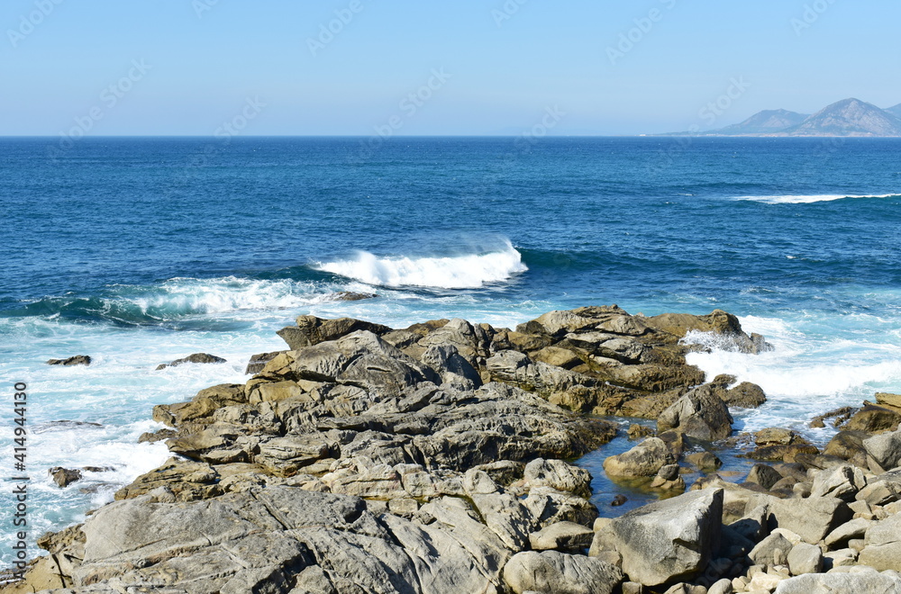 View from a cliff with waves breaking at famous Rias Baixas in Galicia Region. Porto do Son, Coruña, Spain. View from a cliff with waves breaking at famous Rias Baixas in Galicia Region. Porto do Son, Coruña, Spain.