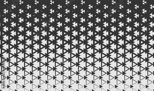 Geometric monochrome seamless pattern with triangles and gradient. Vector abstract texture for background, wallpaper, textile, fabric, web site backdrop