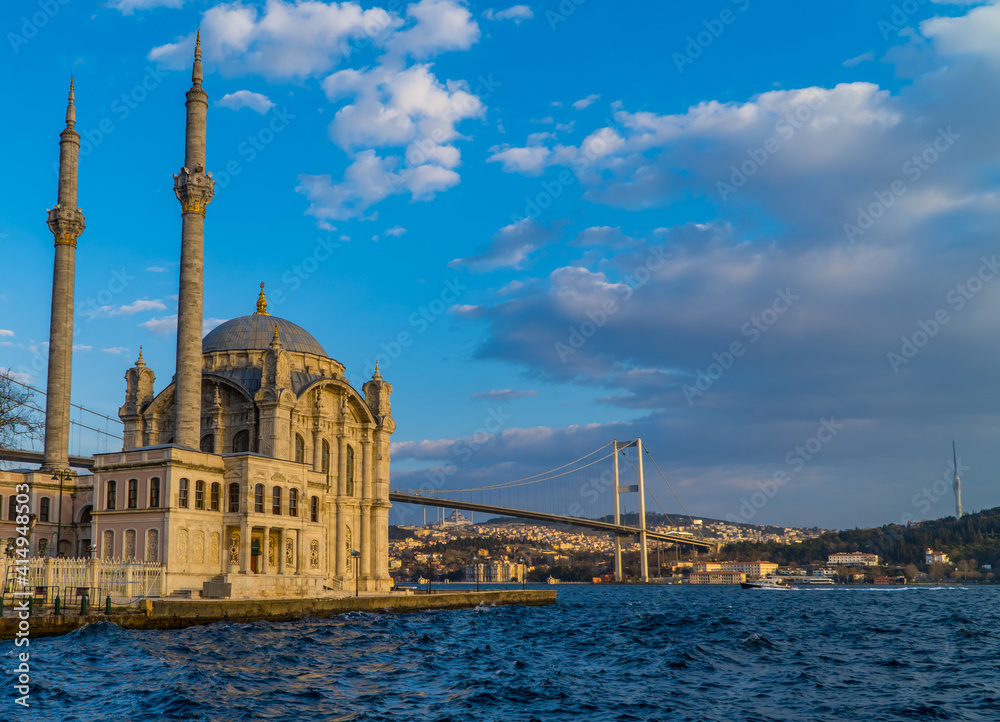 The Ortakoy Mosque and the 15th July Martyrs Bridge on the Bosporus in the area of Besiktas, Istanbul, Turkey