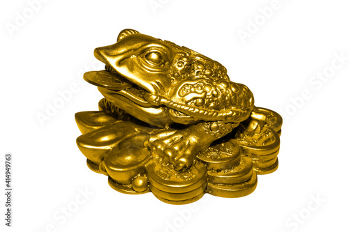 Money toad by Feng Shui on a white background.A money frog with a coin in its mouth.The statuette is a Chinese money toad that brings wealth.