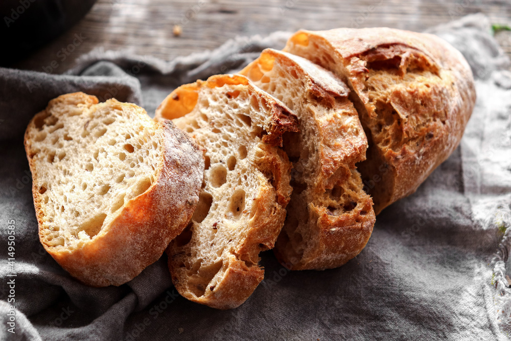 Homemade bread. Sliced bread on a linen napkin. homemade baking Homemade bread. Sliced bread on a linen napkin. homemade baking