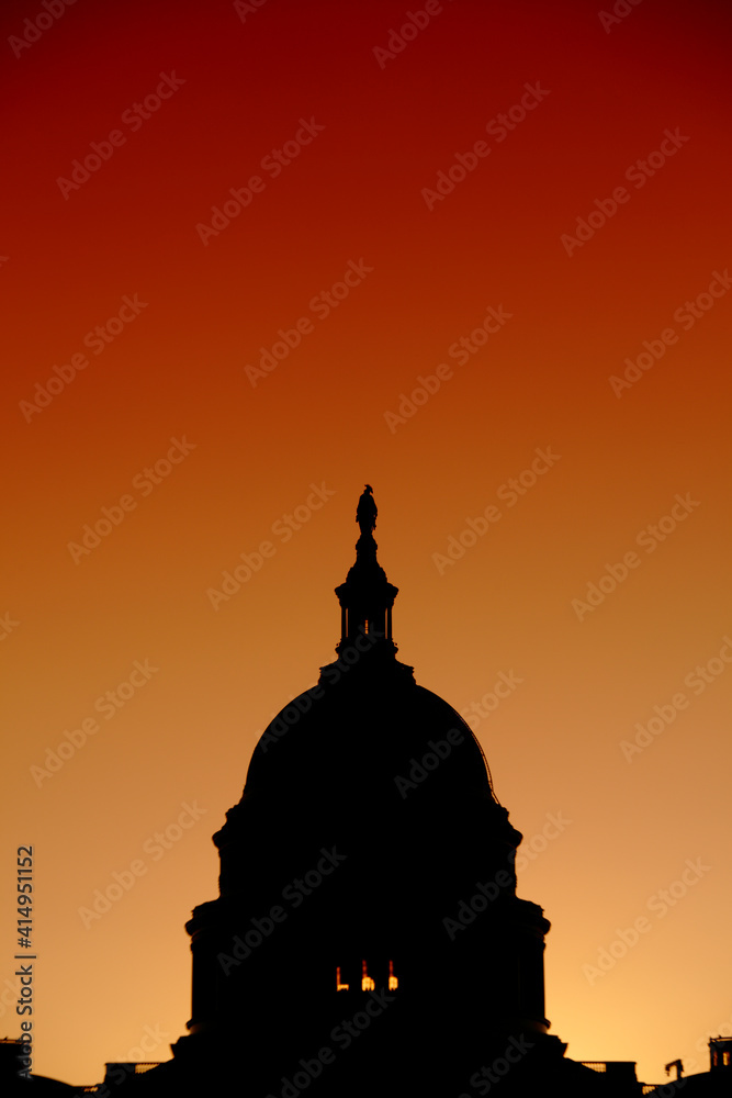 Silhouette of the dome of the United States Capitol at sunset, Washington D.C., USA