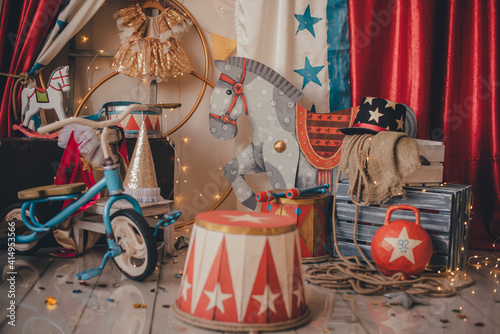 Stylized circus photo zone. Red nude style.