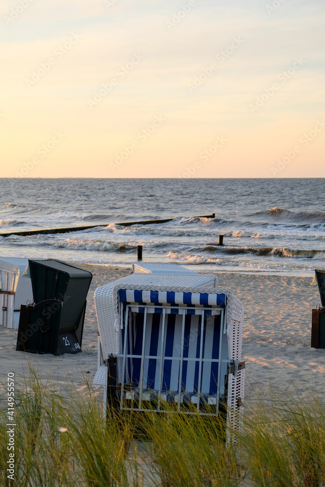 Beach chairs in the evening on the secluded beach of Zempin on the island of Usedom.. Beach chairs in the evening on the secluded beach of Zempin on the island of Usedom..