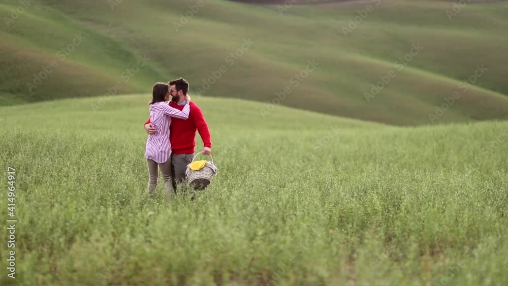 couple running carefree on meadow enjoying freedom and fresh air couple running carefree on meadow enjoying freedom and fresh air