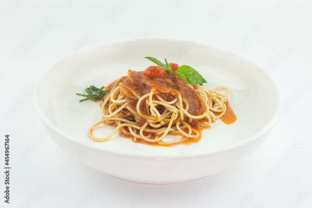Spaghetti with tomato sauce in white plate on white background Spaghetti with tomato sauce in white plate on white background