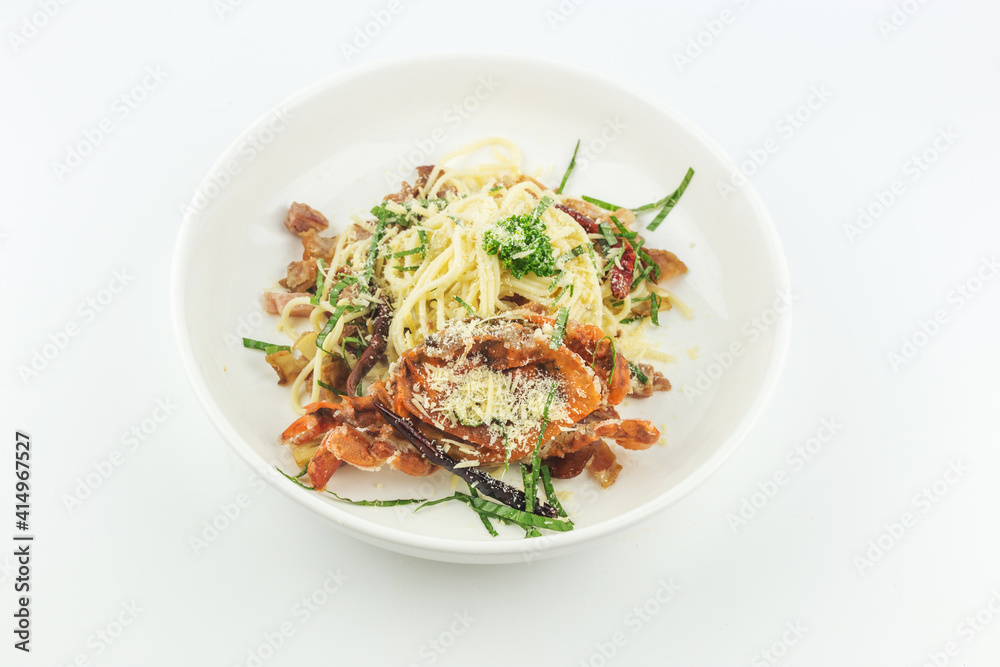 Spaghetti soft shell crab and cheese in white plate on white background