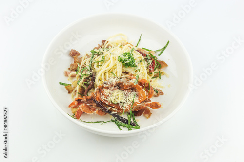 Spaghetti soft shell crab and cheese in white plate on white background