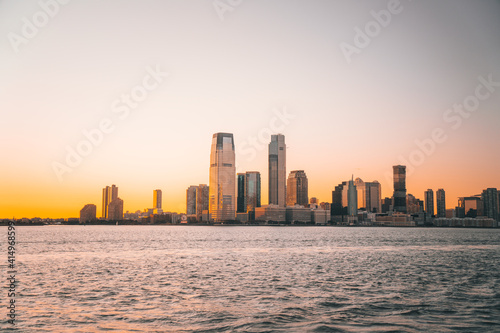 city skyline at sunset new jersey buildings skyscrapers sea ocean  © Alberto GV PHOTOGRAP