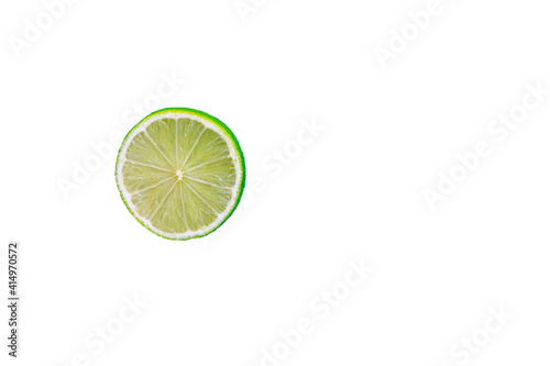 Lime cut into circles on a white background. Isolate