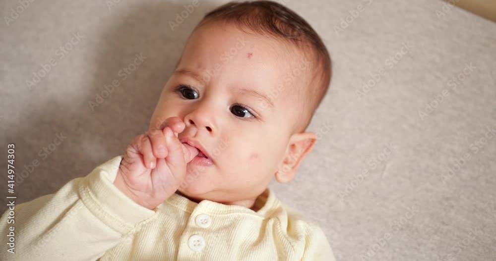 cute little baby boy infant newborn toddler portrait smiling to camera looking. slow motion cute little baby boy infant newborn toddler portrait smiling to camera looking. slow motion
