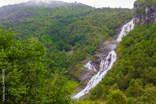 Beautiful Hjellefossen waterfall Utladalen Øvre Årdal Norway. Most beautiful landscapes. photo