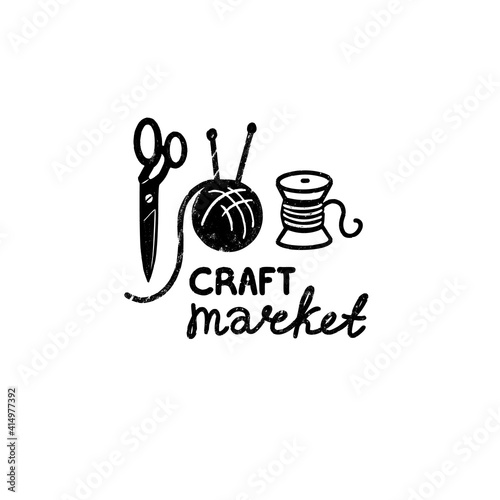Craft market vector logo - a vintage scissors, ball of wool and spool of thread in stamp style with craft market hand lettering. Vintage vector illustration.