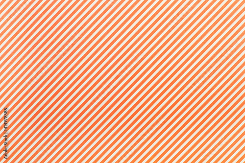 Textura y fondo a rayas naranjas y blancas. Vista superior y de cerca. Copy space photo