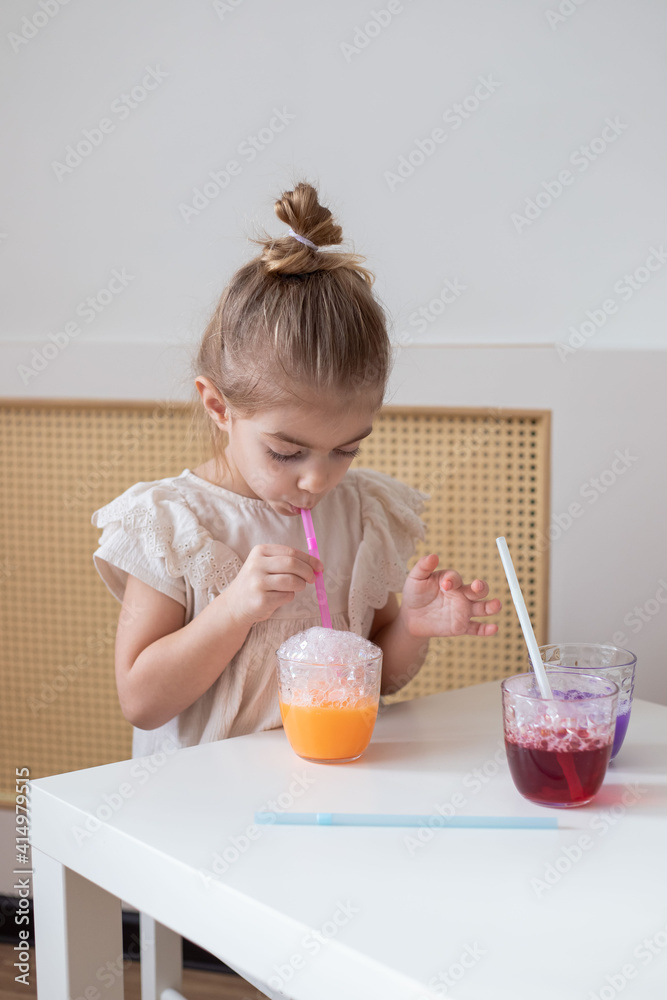 Art activities for kids. Child blow into the glass with colours. Art activities for kids. Child blow into the glass with colours.