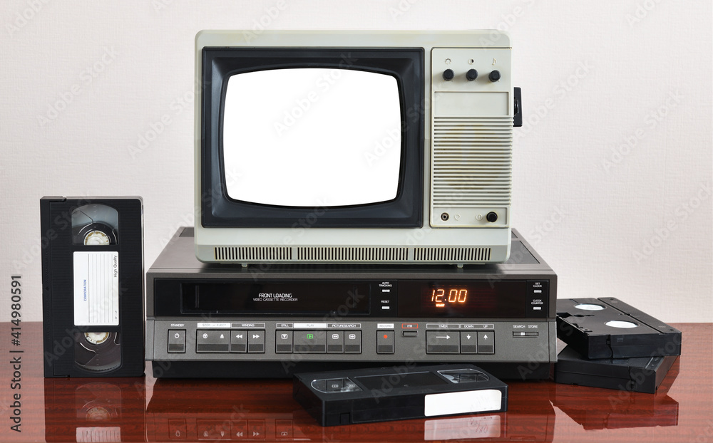 Old silver vintage TV with white screen to add new images to the screen, VCR on the background of wallpaper.
