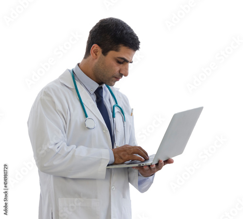 male doctor puts a stethoscope on his neck and holding laptop look to screen monitor isolated