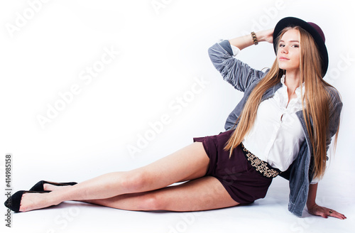 young pretty teenage girl in hat posing cheerful happy smiling on white background isolated, lifestyle people concept
