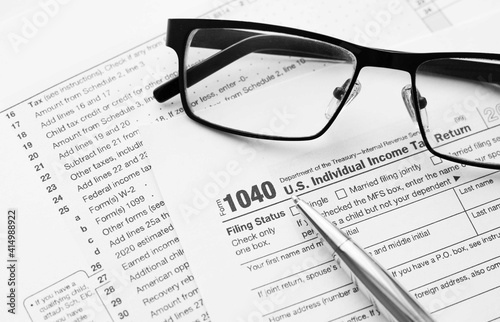 Filling the 1040 Tax Form. Standard US Income Tax Return form.