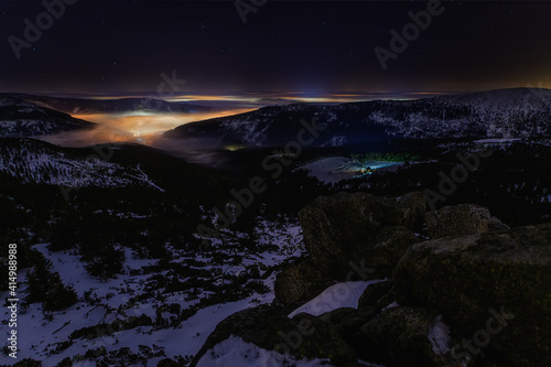 night snowy valley with fog and stars © Jaro