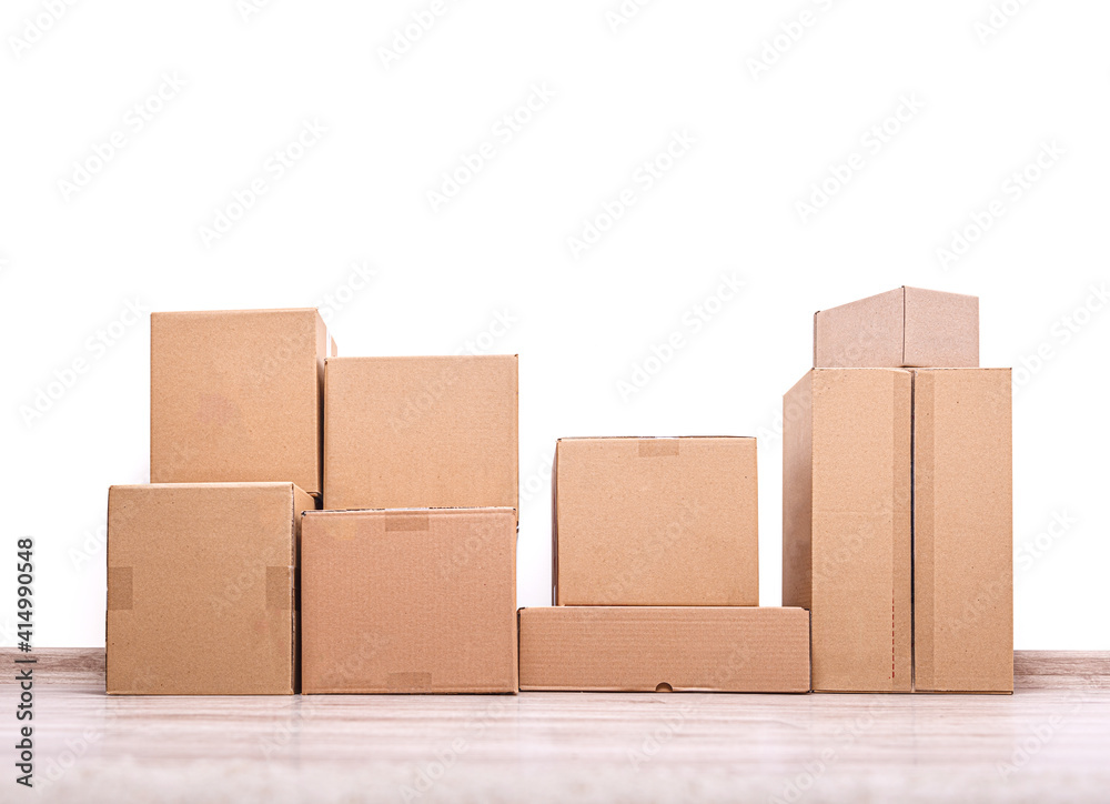 Empty room with cardboard boxes on the floor. Empty room with cardboard boxes on the floor.