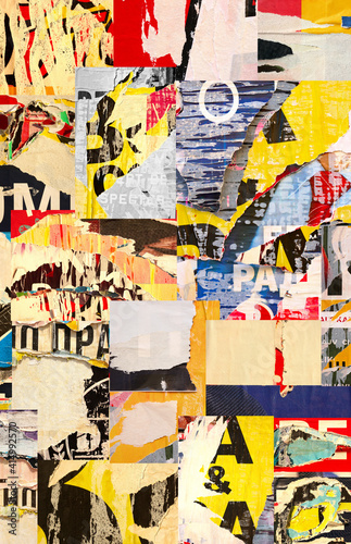 Collage of many numbers and letters ripped torn advertisement street posters grunge creased crumpled paper texture background placard backdrop surface