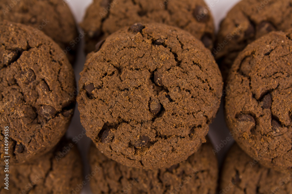 chocolate chip cookies with chocolate pieces on white background chocolate chip cookies with chocolate pieces on white background
