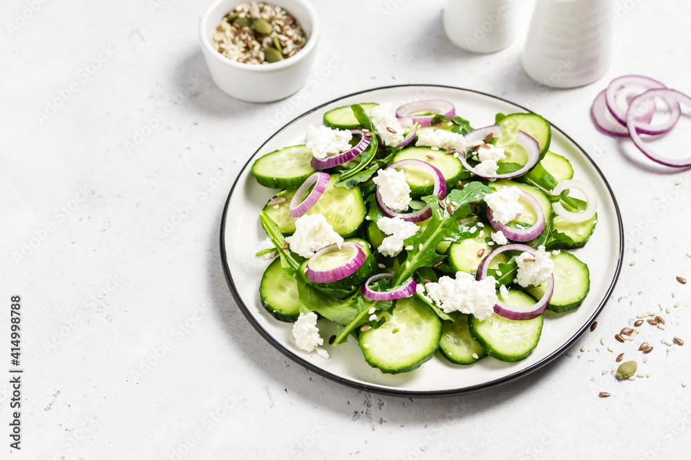 Spring vegan raw detox cucumber salad. Space for text.