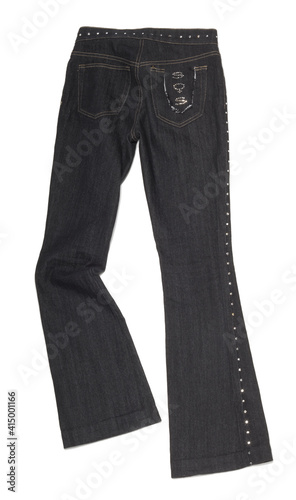 Clothing article, a pair of black jeans with decoration.