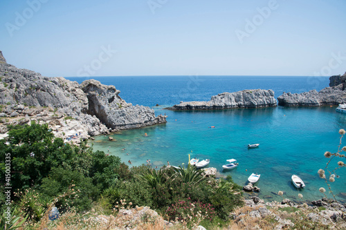 Beautiful landscape with a bay, boats and nature around close to Lindos, Rhodes, Greece