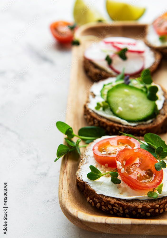 Sandwiches with healthy vegetables and micro greens Sandwiches with healthy vegetables and micro greens