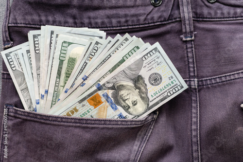 Money in the jeans pocket, dollar in pocket