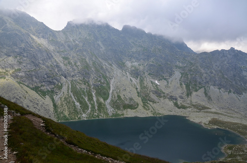 Mountain lake Velke Hincovo pleso under peak Mengusovsky stit in Mengusovska valley in the national park of High Tatras - Slovakia