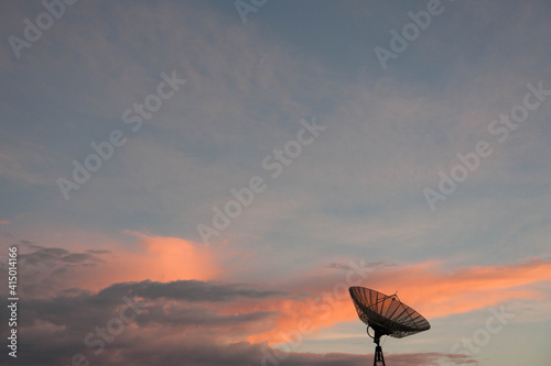 Old antena in a sunset