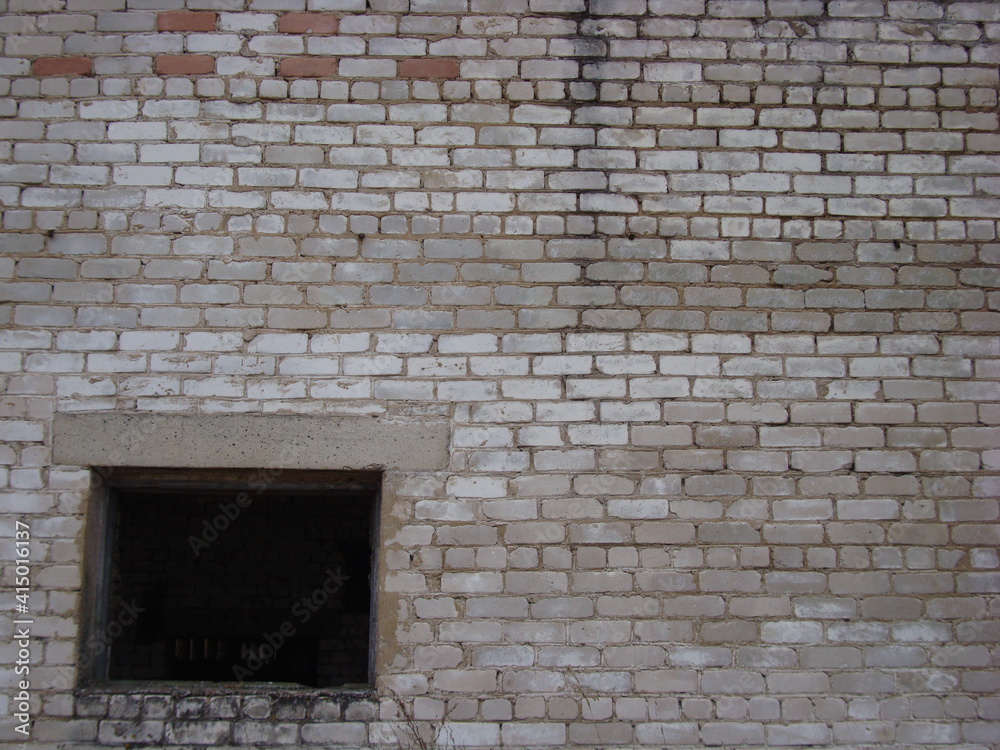 Window opening in a white brick wall Window opening in a white brick wall