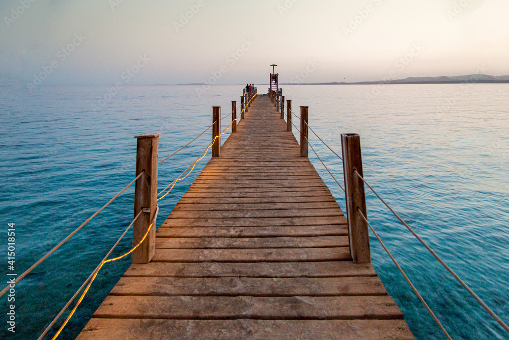 the pier on the sea at sunset, Egypt