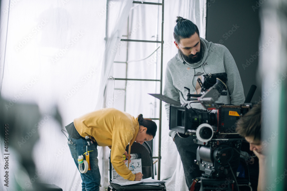Director of photography with a camera in his hands on the set. Director of photography with a camera in his hands on the set.