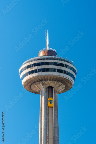 Yellow Bug elevators (lifts). Skylon Tower, Niagara Falls, Ontario, Canada photo