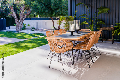 Chairs and table arranged in patio