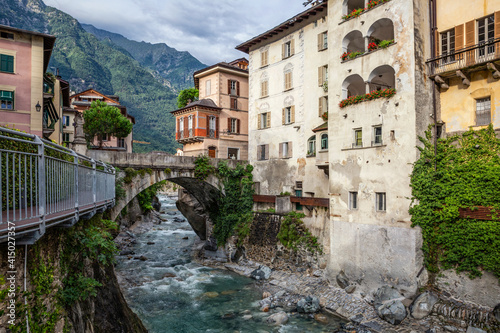 Mera river by buildings at Palazzo Pestalozzi in town, Valchiavenna, Chiavenna, Province of Sondrio, Lombardy, Italy photo