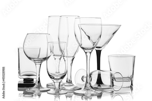Set of assorted empty wine glasses isolated on white background
