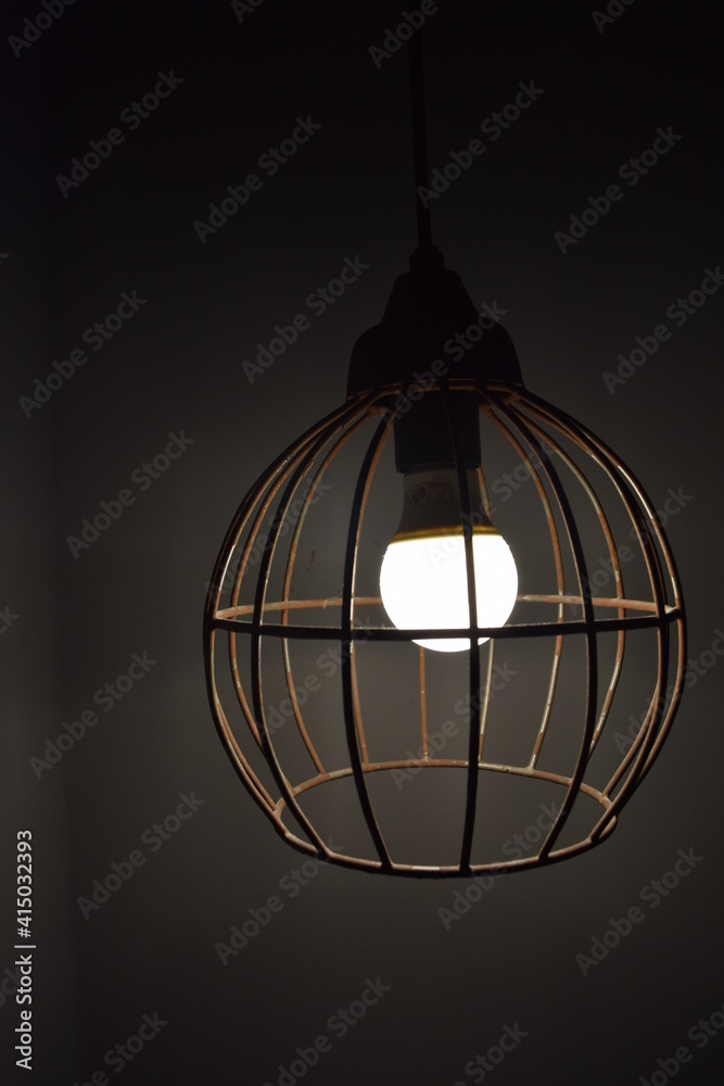 Lamp in metal wire frame, cage, industrial design, Mannheim, Germany Lamp in metal wire frame, cage, industrial design, Mannheim, Germany