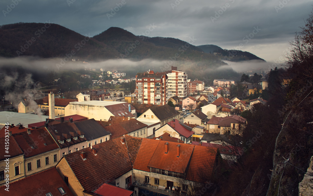 Beautiful morning view on City Krapina with fog and mountains in the background in Croatia, county hrvatsko zagorje 