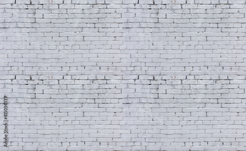 The seamless texture of the brick is brown. Background of empty brick basement wall.